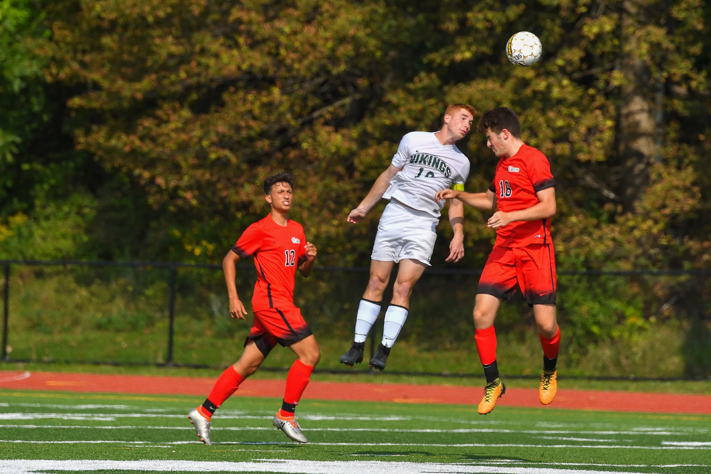 A Hudson Valley men's player striking the ball
