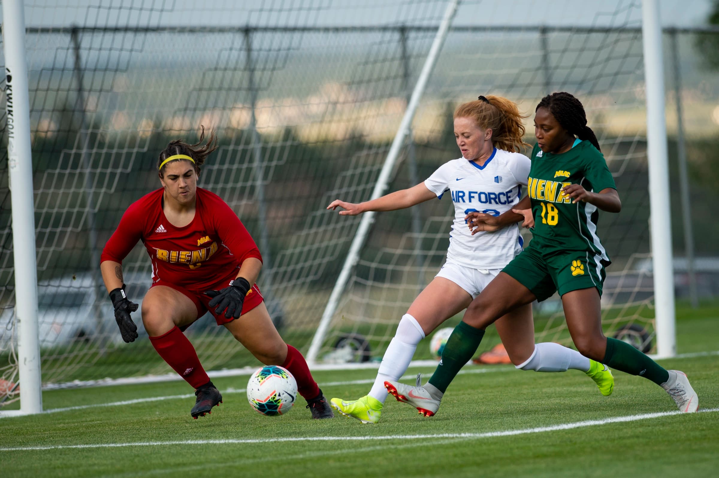 An Air Force women's goalkeeper collecting the ball against Siena