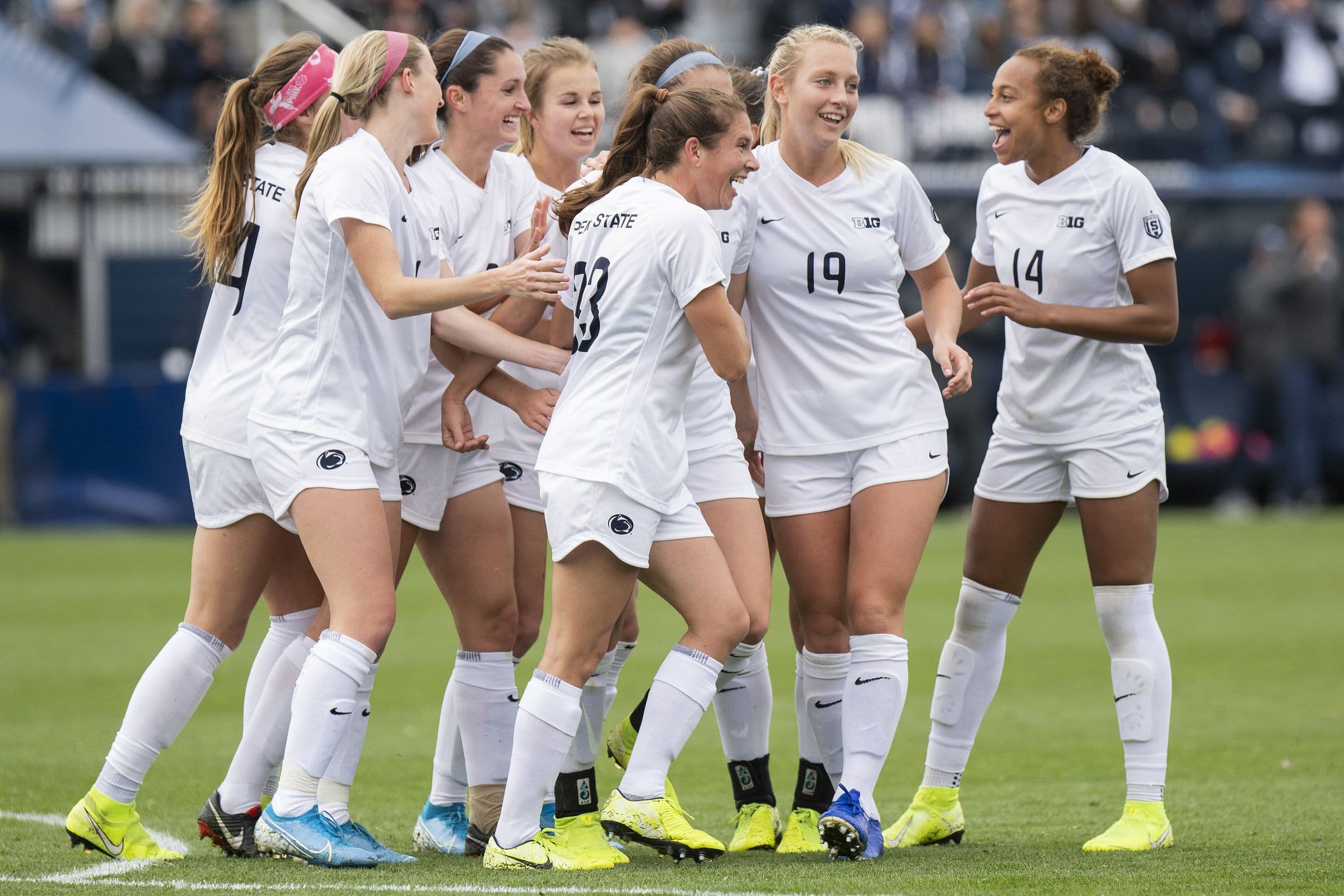 Penn State women's players celebrating a goal